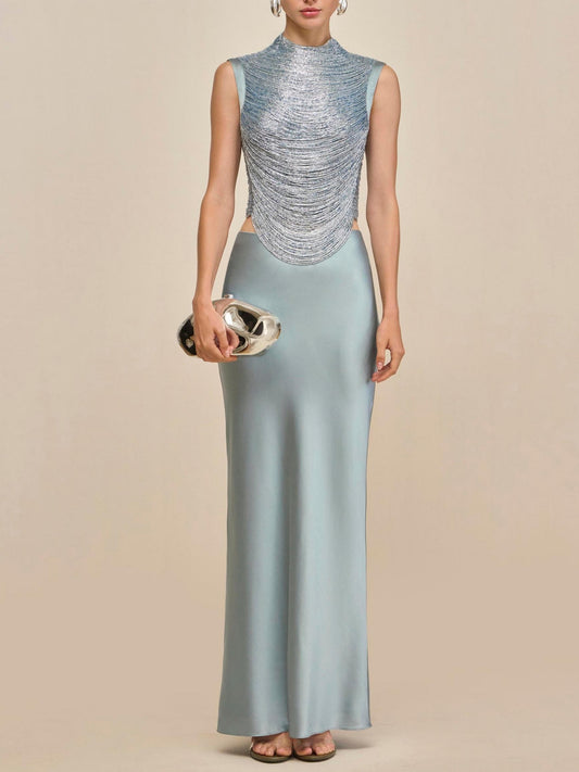Elegant Celadon Ensemble: Sleeveless Fringe Top Paired with Flowing Satin Skirt