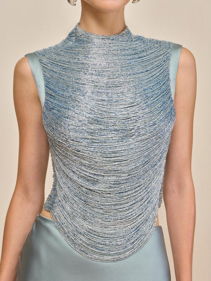 Elegant Celadon Ensemble: Sleeveless Fringe Top Paired with Flowing Satin Skirt